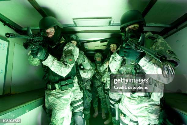 swat team preparing - swat team stock pictures, royalty-free photos & images