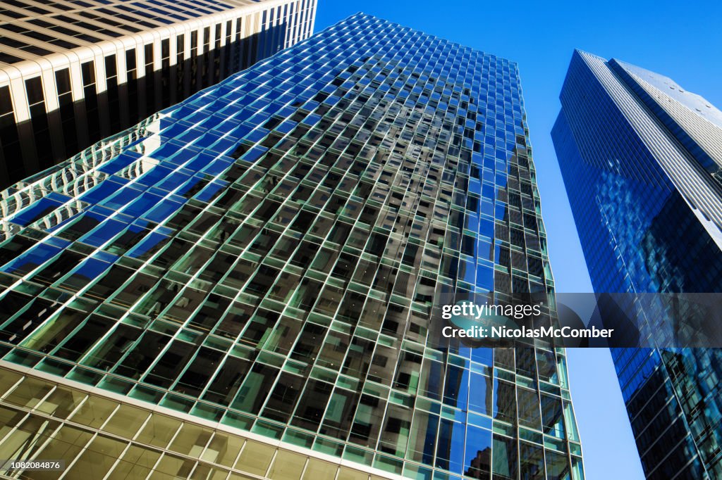 San Francisco Low Angle view of glass Salesforce office tower with reflections