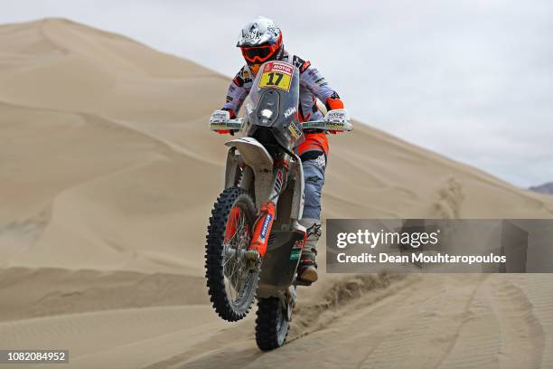 Factory Racing Team No. 17 Motorbike ridden by Laia Sanz of Spain competes in the desert on the sand during Stage Six of the 2019 Dakar Rally between...
