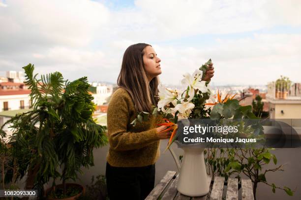 Arranging flowers on a Rooftop