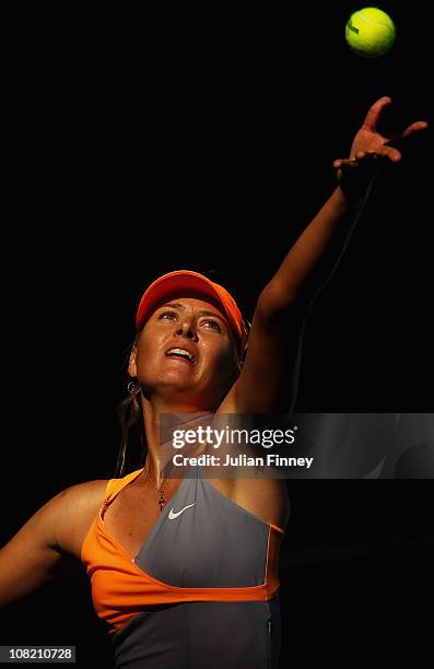 Maria Sharapova of Russia serves in her third round match against Julia Goerges of Germany during day five of the 2011 Australian Open at Melbourne...