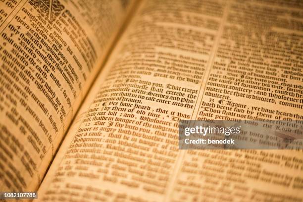 king james bible from 1611 in the british library london uk - british library stock pictures, royalty-free photos & images