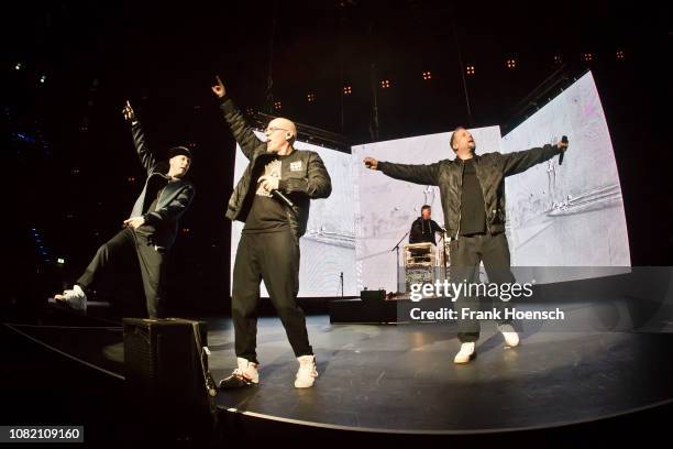 Singer Michi Beck, Thomas D, And.Ypsilon and Smudo of the German band Die Fantastischen Vier perform live on stage during a concert at the...