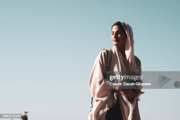 a bold muslim woman - creative images stock pictures, royalty-free photos & images