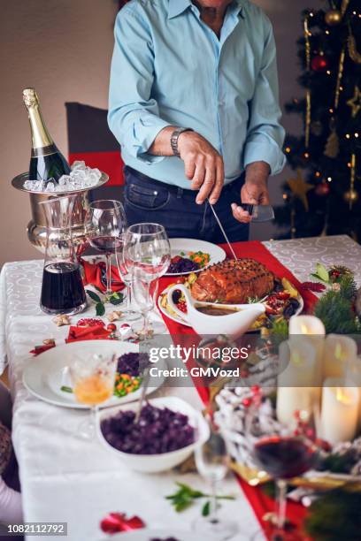 christmas dinner with glazed holiday ham with cloves, vegetables, minced pies and eggnog orange trifle - christmas mince pies stock pictures, royalty-free photos & images