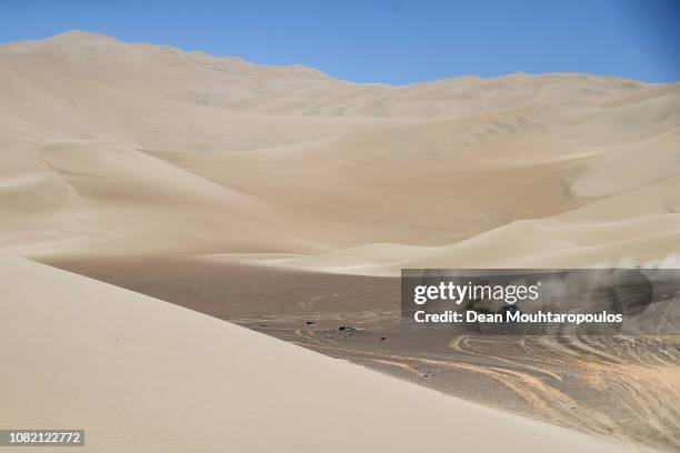 Raid Mini Jcw Team no. 300 MINI JOHN COOPER WORKS BUGGY car driven by Carlos Sainz of Spain and Lucas Cruz of Spain compete in the desert on the sand...