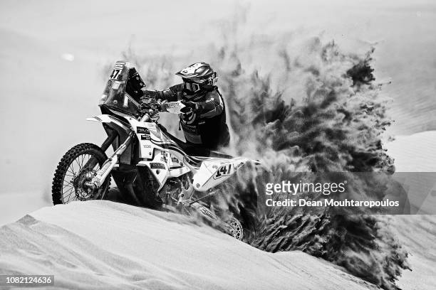 Richard Main Redline KTM No. 147 Motorbike ridden by Richard Main of Great Britain competes in the desert on the sand during Stage Six of the 2019...