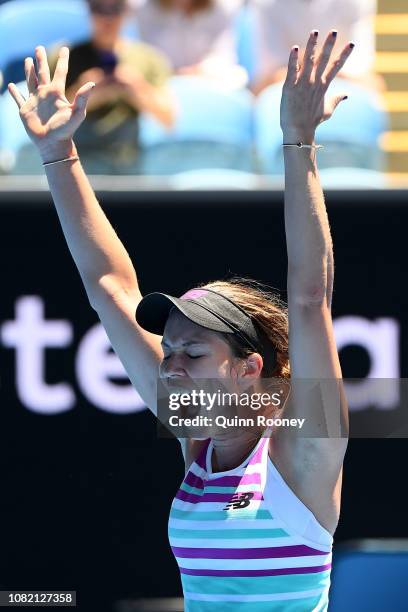 Danielle Collins of the United States celebrates match point in her first round match against Julia Goerges of Germany during day one of the 2019...