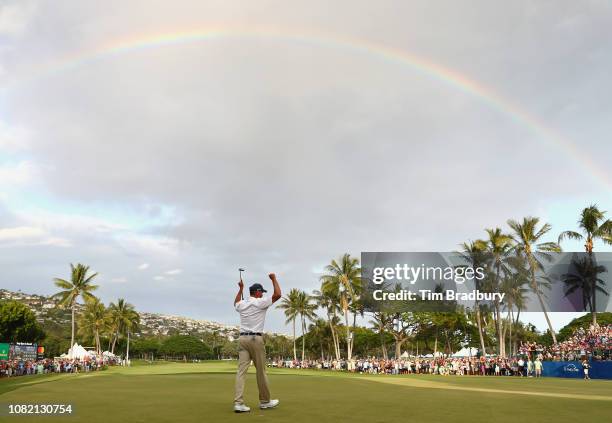 Matt Kuchar of the United States celebrates after making a putt for birdie on the 18th green to win the Sony Open In Hawaii at Waialae Country Club...