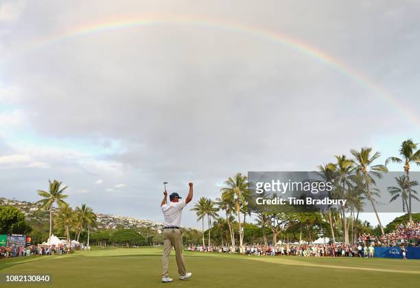Matt Kuchar of the United States celebrates after making a putt for birdie on the 18th green to win the Sony Open In Hawaii at Waialae Country Club...