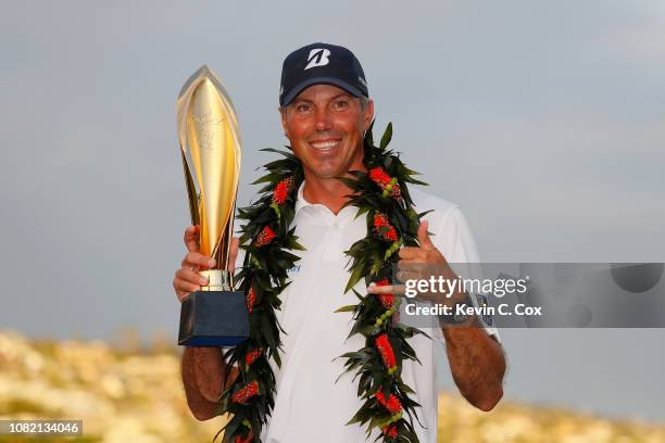 Matt Kuchar of the United States poses with the trophy after winning the Sony Open In Hawaii at Waialae Country Club on January 13, 2019 in Honolulu,...
