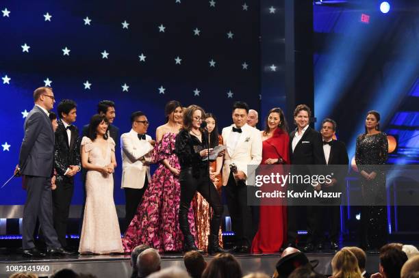 Cast and producers of 'Crazy Rich Asians' accept the Best Comedy award onstage at the 24th annual Critics' Choice Awards at Barker Hangar on January...