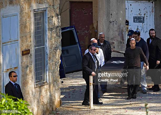 Pallbearers carry the coffin of Sonia Peres, during her funeral ceremony on January 21, 2011 in Ben Shemen, Israel. Thousands of people including...