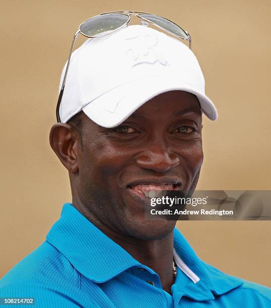 Former footballer Dwight Yorke watches the golf during the second round of The Abu Dhabi HSBC Golf Championship at Abu Dhabi Golf Club on January 21,...