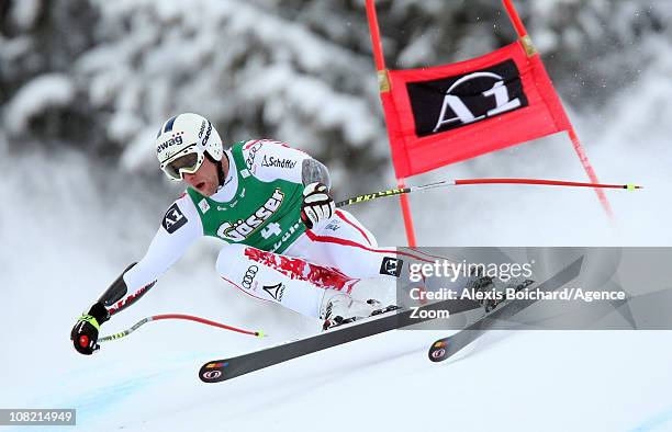 Romed Baumann of Austria skis during the Audi FIS Alpine Ski World Cup Men's SuperG on January 21, 2011 in Kitzbuehel, Austria.