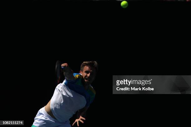 Peter Gojowczyk of Germany serves in his first round match against Karen Khachanov of Russia during day one of the 2019 Australian Open at Melbourne...