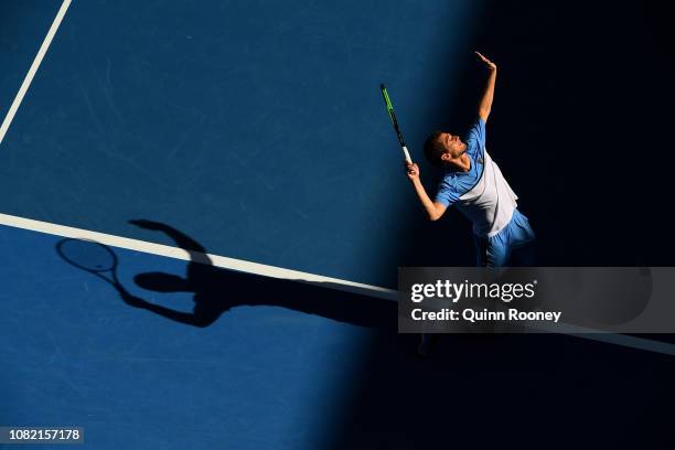 Pedro Sousa of Portugal serves in his first round match against Alex De Minaur of Australia during day one of the 2019 Australian Open at Melbourne...