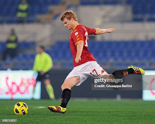 John Arne Riise of Roma in action during the Tim Cup match between Roma and Lazio at Stadio Olimpico on January 19, 2011 in Rome, Italy.