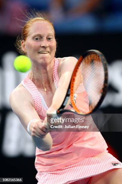 Alison Van Uytvanck of Belgium plays a backhand in her first round match against Caroline Wozniacki of Denmark during day one of the 2019 Australian...