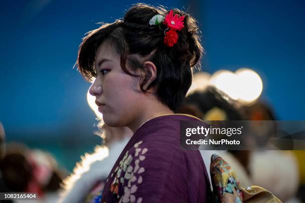 Japanese women wearing kimonos attend their Coming of Age Day celebration ceremony at Toshimaen amusement park in Tokyo, Japan January 14, 2019.