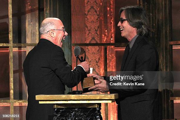 Inductee David Geffen and musician Jackson Browne performs onstage at the 25th Annual Rock and Roll Hall of Fame Induction Ceremony at...