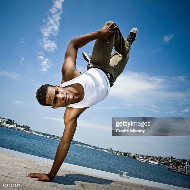 break dancer on pier - hiphop stock pictures, royalty-free photos & images