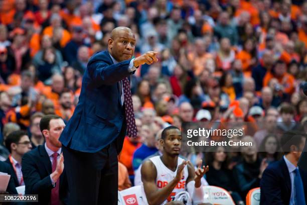 Associate head coach Adrian Autry of the Syracuse Orange instructs players during the game against the Georgetown Hoyas at the Carrier Dome on...