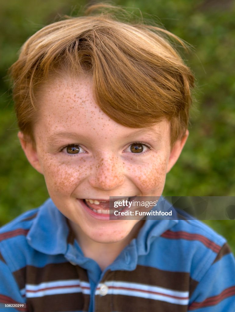Boy Redhead Freckle Face Laughing, Child Smiling with Missing Teeth