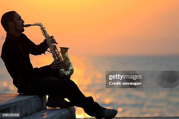 saxophoniste - saxophoniste photos et images de collection