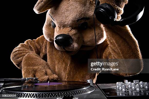 turntable bear costume dj with headphones - bear suit 個照片及圖片檔