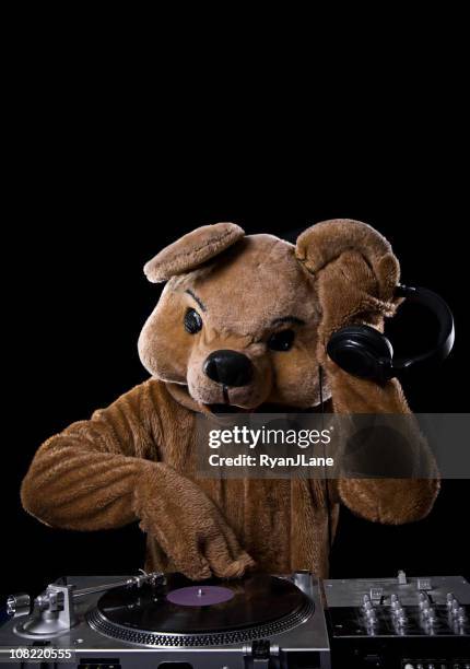 bear costume dj with turntable and headphones - radio dj stock pictures, royalty-free photos & images