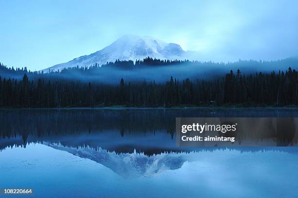 mount rainier reflection on lake at dawn - mt rainier stock pictures, royalty-free photos & images