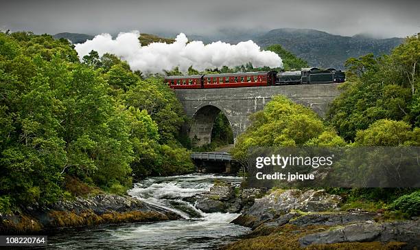 scotland's steam train and landscape - scotland train stock pictures, royalty-free photos & images