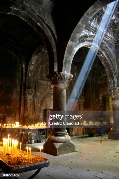 medieval church in armenia with light shining through ceiling - armenian church stock pictures, royalty-free photos & images