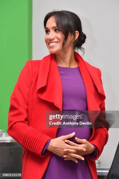 The Duchess of Sussex smiles as the Duke and Duchess of Sussex officially open Number 7, a Feeding Birkenhead citizens supermarket and community...