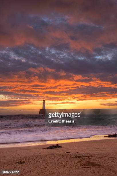 north sea lighthouse at dawn - theasis stock pictures, royalty-free photos & images