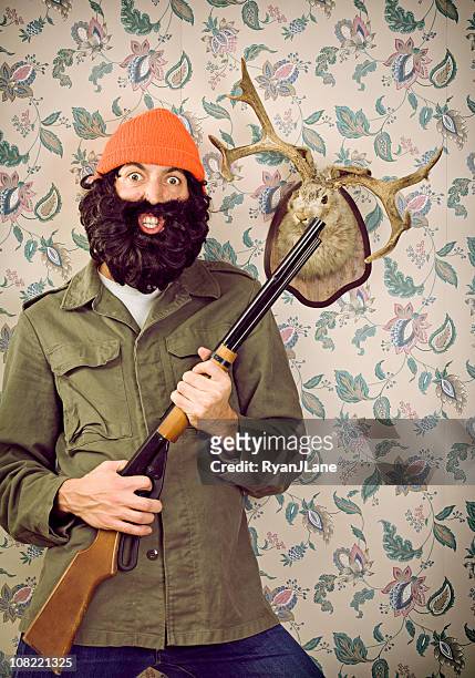 crazy hunter &amp; jackalope posing for a portrait - taxidermy stock pictures, royalty-free photos & images