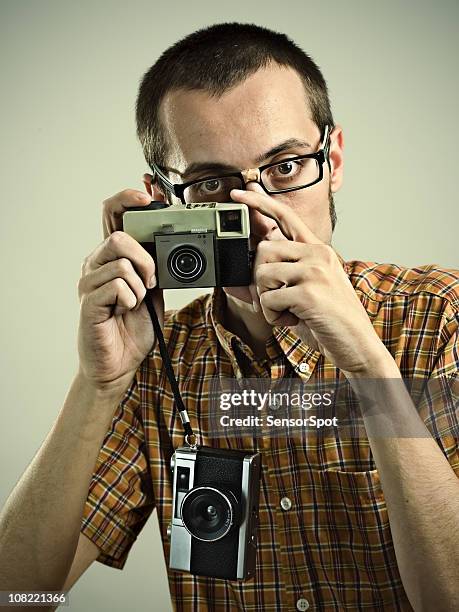 junger mann fotograf - funny photographer studio stock-fotos und bilder