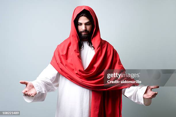 man who looks like jesus christ holding arms out - beautiful jesus christ stock pictures, royalty-free photos & images