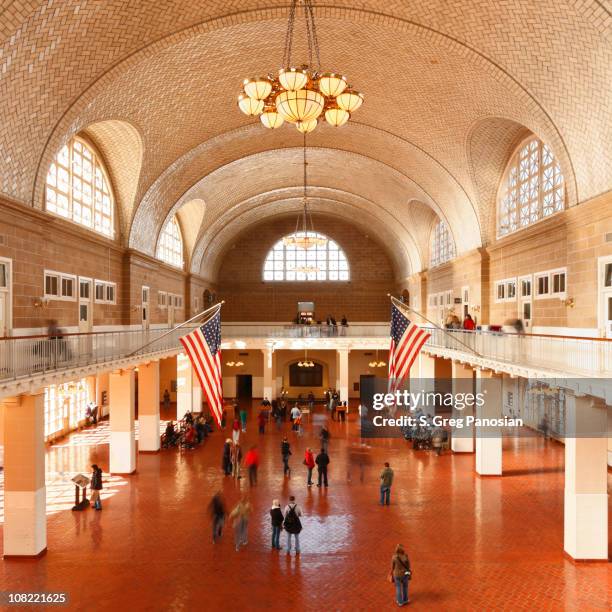 the great hall at ellis island in new york city - ellis island stock pictures, royalty-free photos & images