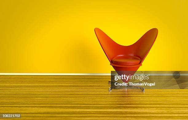 the 70s. heart-shaped cone chair - comfy chair stock pictures, royalty-free photos & images