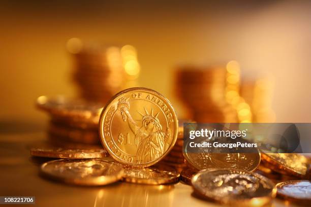 gold coins on background - gold coin stockfoto's en -beelden