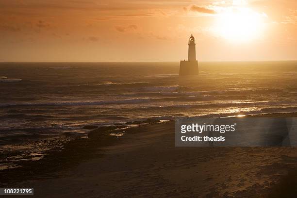 north sea lighthouse and beach at dawn - theasis stock pictures, royalty-free photos & images
