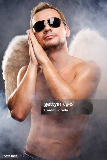 angel man with fog - man angel wings stock pictures, royalty-free photos & images