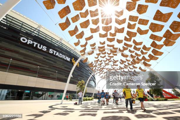 Spectators arrive at Optus Stadium for the inaugural test cricket match to be played during day one of the second match in the Test series between...
