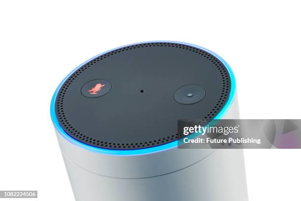Detail of the control buttons on an Amazon Echo Plus smart speaker, with the Mute Microphone button highlighted in red, taken on January 9, 2019.