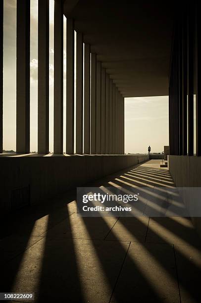 building columns shadows in hallway - contemporary arts center stock pictures, royalty-free photos & images