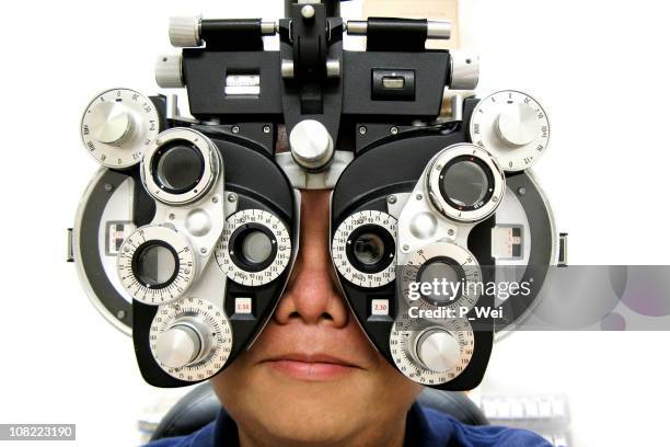 eye test - phoroptor stock pictures, royalty-free photos & images