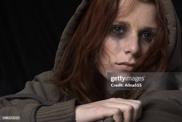 traurige frau gesicht mit make-up smeared - drug abuse stock-fotos und bilder