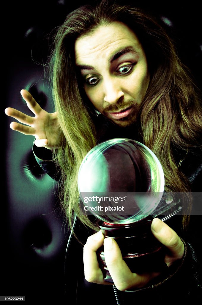 Man Holding Fortune Ball